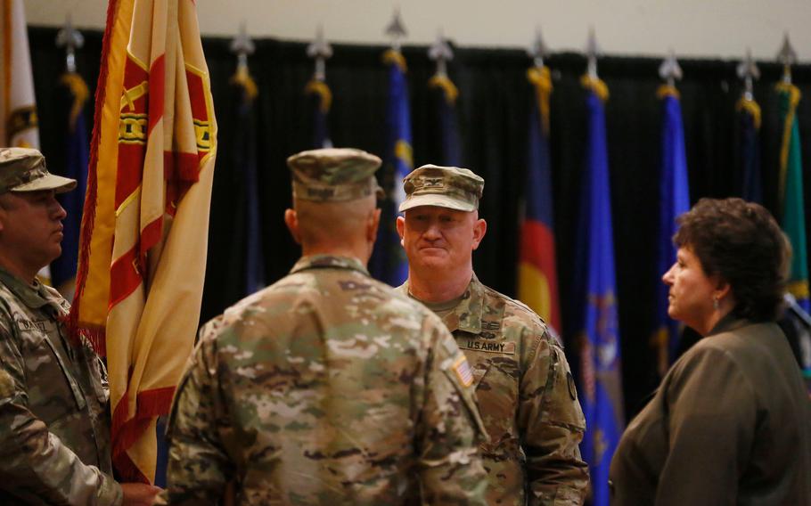 Garrison Commander Colonel Stuart James relinquishes command to incoming Garrison Commander Colonel James Brady in a Fort Bliss Garrison Change of Command Ceremony Thursday, July 8, 2021, at the Fort Bliss Centennial Banquet and Conference Center.