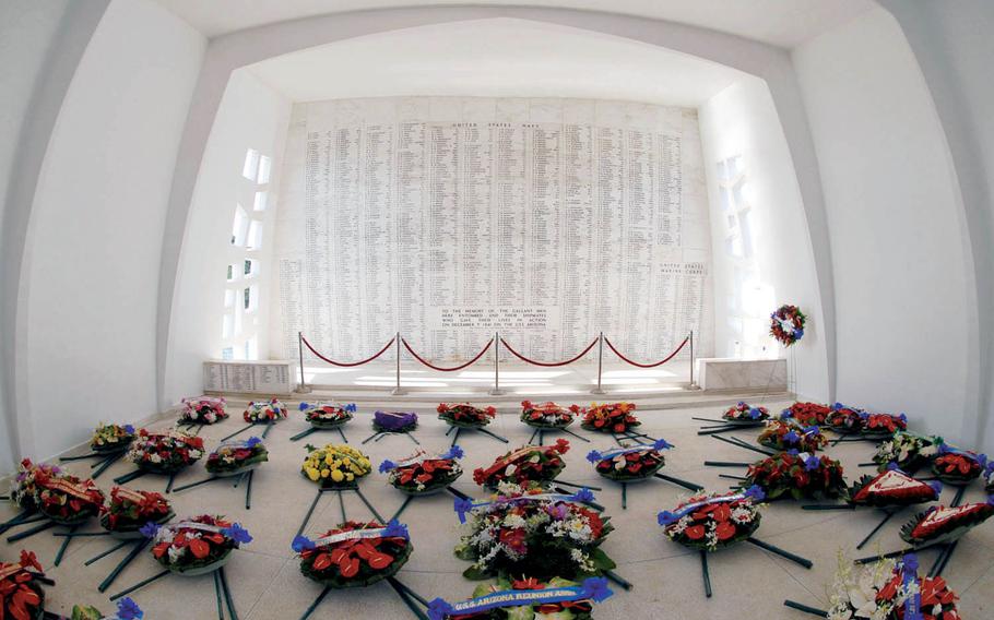 Wreaths serving as a tribute to servicemembers killed during the Dec. 7, 1941, attack on Pearl Harbor, adorn the USS Arizona Memorial in 2007.