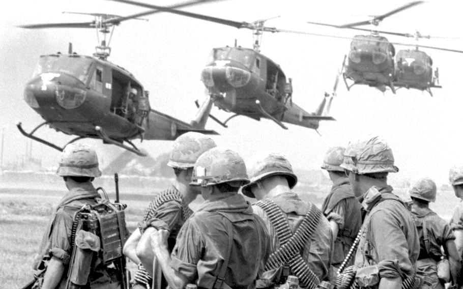 South Vietnam, April, 1967: Helicopters stream in to take soldiers from the 27th Infantry, 25th Infantry Division on an "Eagle Mission" to investigate suspicious activity and round up Viet Cong suspects in Hau Nghia province.