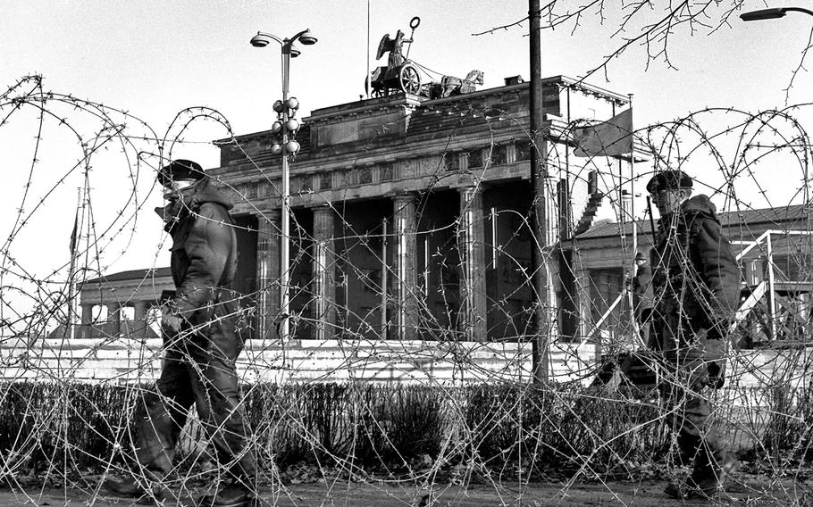 Berlin, December 16, 1961: British soldiers from Company B, 1st Battalion, Durham Light Infantry patrol the no-man's land in front of the newly-constructed Berlin Wall and Brandenburg Gate. In addition to the patrols, the unit also guarded the nearby Soviet war memorial and maintained an observation post atop the old Reichstag building.