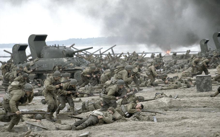 The American forces storm Omaha Beach during the massive D-Day invasion of Normandy as depicted in the Steven Spielberg movie "Saving Private Ryan."
 
