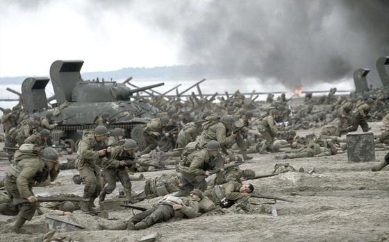 The American forces storm Omaha Beach during the massive D-Day invasion of Normandy as depicted in the Steven Spielberg movie “Saving Private Ryan.”