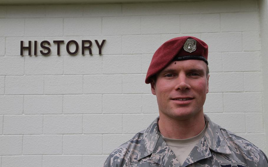 Air Force Staff Sgt. Zachary Hoeh received the the Distinguished Flying Cross with Valor for dropping into mine-laden terrain near the Afghan border with Pakistan to rescue a soldier who was frozen in the midst of an active minefield after the soldier's squad was decimated by successive IED blasts. Hoeh is seen here at Kadena Air Base earlier this year.