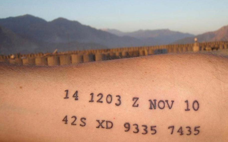 Roger Sparks carries on his forearm a tattooed reminder of the time, date and military map coordinates from the day he landed on an Afghanistan mountainsde and into gunfire, explosions and wounded and dying soldiers. The pararescuemen received the call at 1203 Zulu time, or 4:03 p.m. local time in Afghanistan.