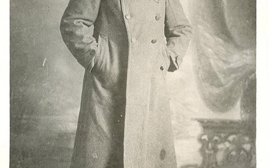 Portrait of Sgt. William Shemin in uniform overcoat.