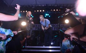 Actor and Lt. Dan Band bassist Gary Sinise jams stage at a concert and block party dedicated to Medal of Honor recipients in Honolulu on Oct. 5, 2012. The concert was part of the weeklong 2012 Medal of Honor Convention. The reunion of 52 medal recipients is thought by organizers to be the largest ever gathering of its kind.
