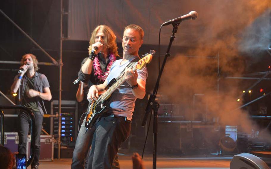 Actor and Lt. Dan Band bassist Gary Sinise jams on stage at a concert and block party dedicated to Medal of Honor recipients in Honolulu on Oct. 5, 2012. The concert was part of the weeklong 2012 Medal of Honor Convention. The reunion of 52 medal recipients is thought by organizers to be the largest ever gathering of its kind.
