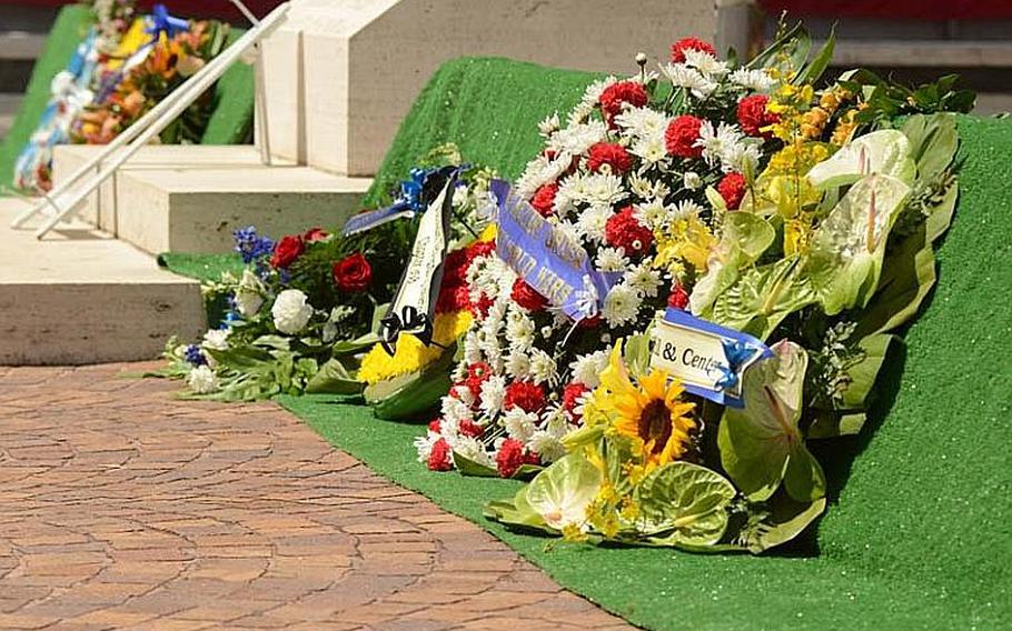 Wreaths left by veterans groups lay near a stone memorial dedicated to fallen Medal of Honor recipients at the National Cemetery of the Pacific in Honolulu on Oct. 3, 2012. Of the 81 living recipients of the nation?s highest military honor, 52 attended the ceremony, a figure organizers say is probably the largest ever gathering of Medal of Honor recipients.