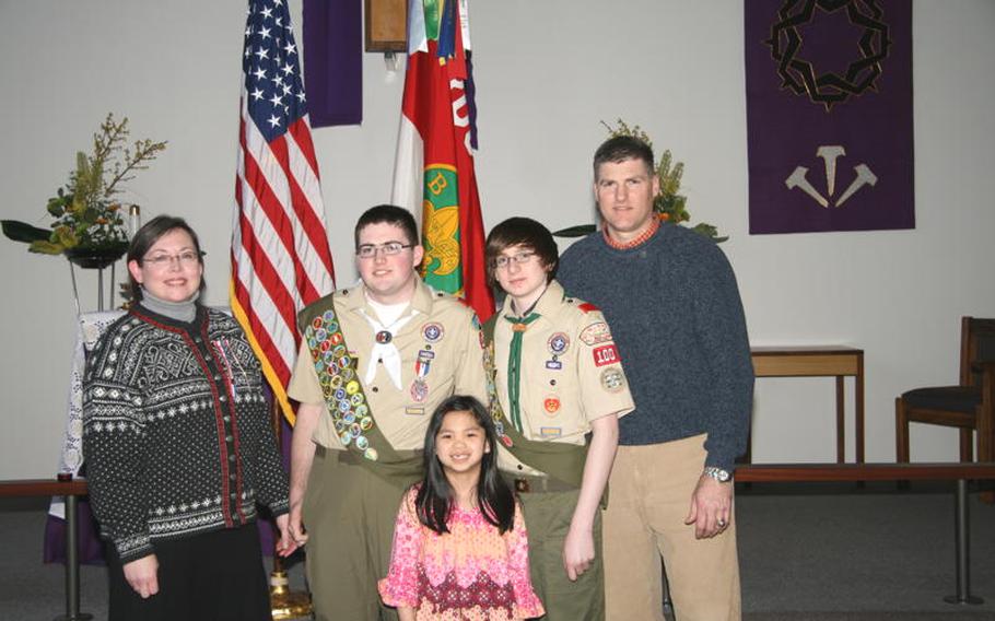 Sean Ballard, second from left,  with his family at an Eagle Scout ceremony. Others, from left, are his mother, Tracy,  Maryn, Will and his father, Air Force Lt. Col. Chris Ballard.  The Veterans of Foreign Wars Department of Europe named Ballard Scout of the Year and the American Legion Department of France elected him Eagle Scout of the Year.
