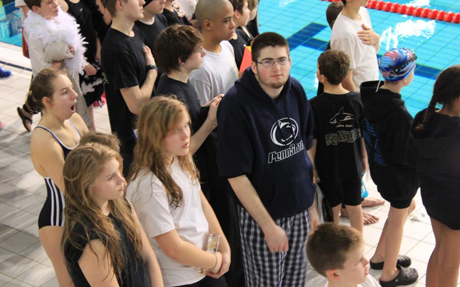 Sean Ballard is surrounded by members of the Orcas International Swim Team at the 2010 European Forces Swim League Championships in Eindhoven, Netherlands, in February.  Ballard was co-captain of the team, even though he wasn't able to compete in the water due to his spinal surgeries and the subsequent infections.  He served as an assistant to the coaches and helped the swimmers at the team's meets.