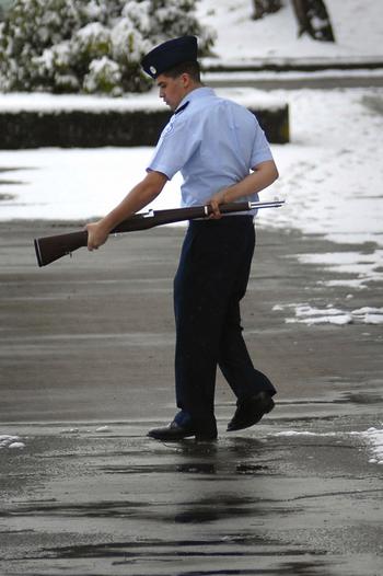 Robert Rosales, a Bitburg High School senior, practices his solo routine in March at Kaiserslautern High School before the annual Department of Defense Dependents Schools Europe drill team competition. Teams from Germany, Italy, Spain and the United Kingdom took part.