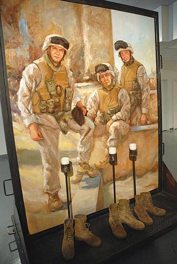 An exhibit of eight paintings featuring the 22 Marines killed with Company L, 3rd Battalion, 25th Regiment based in Columbus, Ohio is on display this summer at the Zanesville auditorium. Sgt. Bradley Harper, from Dresden, Ohio, just north of Zanesville, was killed while attached to the unit in 2005. The artist recently added his portrait to the exhibit.