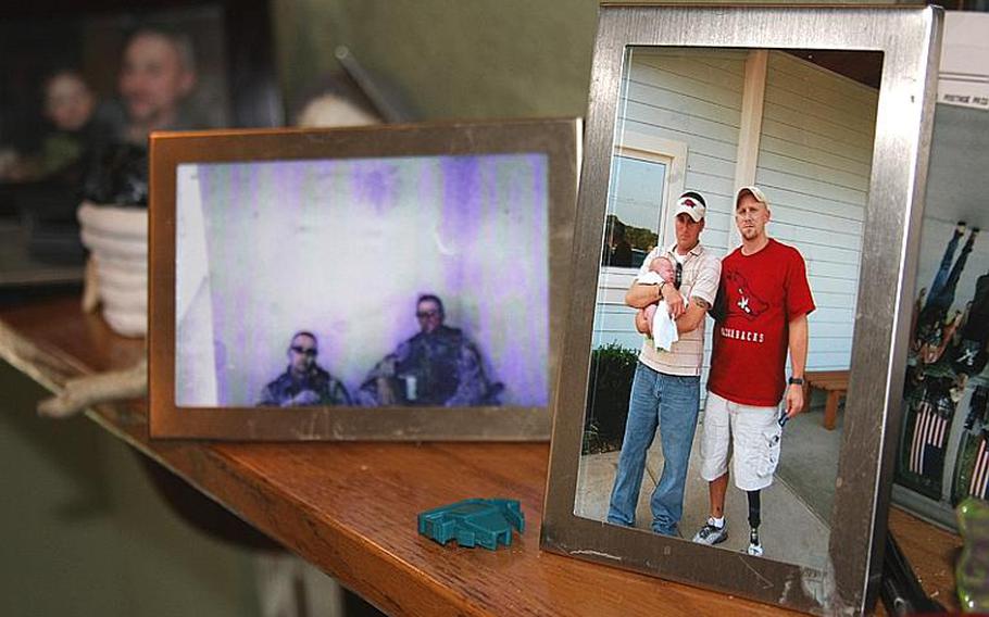 Pictures of Lisek's Army friends sit on the mantle in his living room.