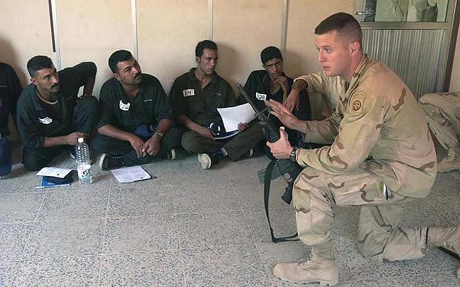 Then-Capt. Patrick Murphy speaks to Iraqis during his deployment to Baghdad in 2004.