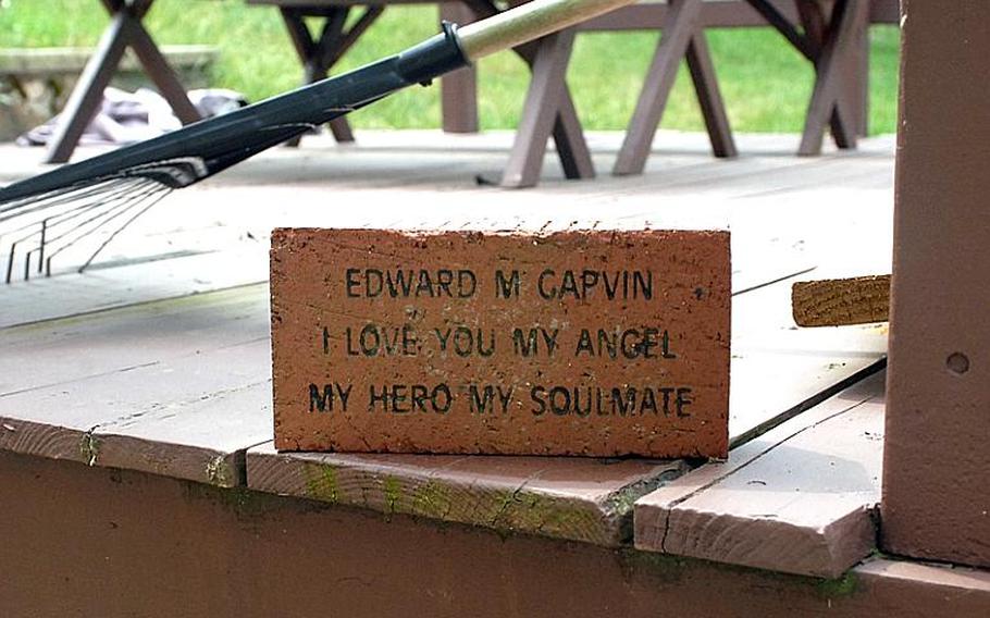 A brick outside the house Melissa Garvin bought with her widow's benefits; Eddy wanted her to buy a home.