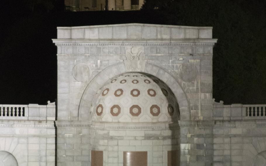 The front of Arlington National Cemetery is lit up around 5 a.m. on Sunday, May 4, 2014. 