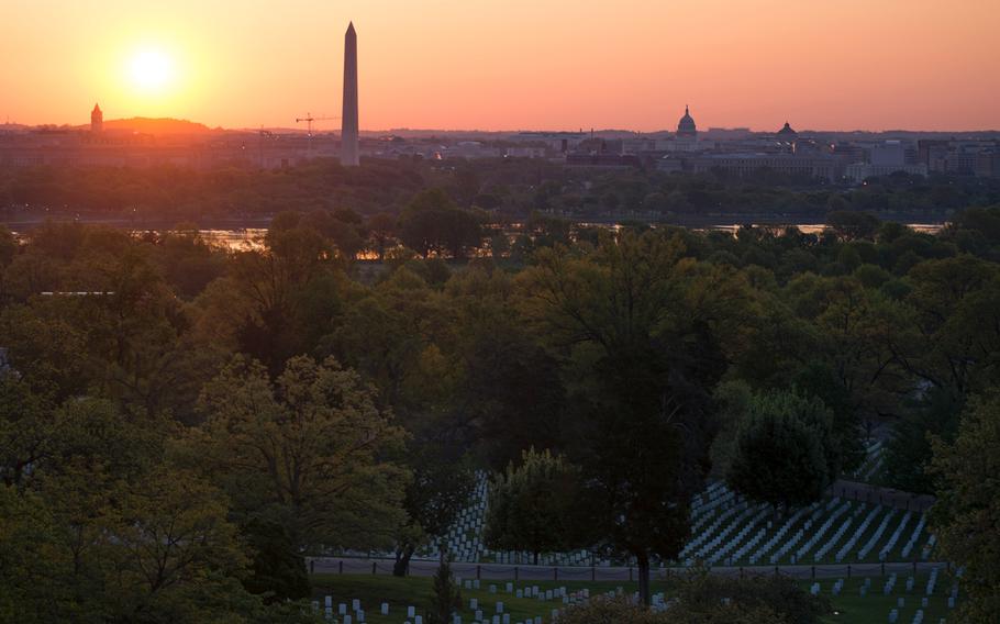 The sun is completely over the horizon on the morning of May 4, 2014. The Capitol Building and the Washington Monument can be seen in the distance over the Potomac River. 