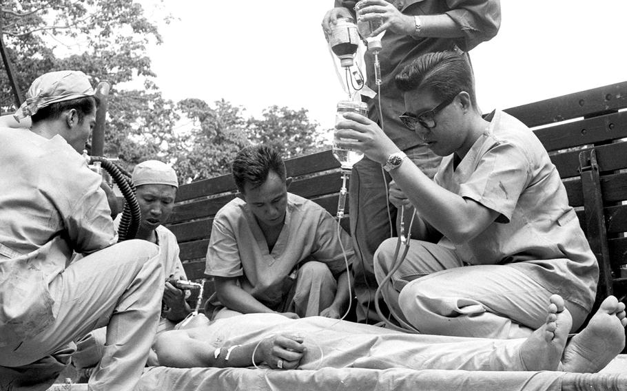 A badly-wounded U.S. Special Forces sergeant is moved from a small field hospital to Saigon in 1965. The soldier had been shot in the head while delivering medical supplies to a remote Vietnamese village.