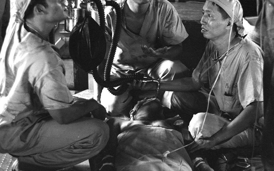 Filipino medics fight to keep a U.S. Special Forces sergeant alive at a small field hospital in Vietnam in 1965.