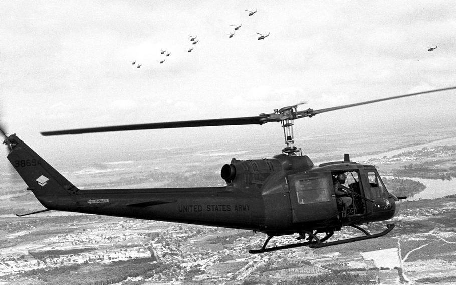 May, 1965: U.S. Army helicopters carry troops over the Vietnamese countryside near Binh Hoa. 