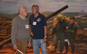  John Astle, left, and Roger Hunt, right, view an exhibit on Oct. 21, 2016 in the Vietnam section of the National Museum of the Marine Corps in Triangle, VA, near Quantico base. The men have been friends since 1966, when they spent five months together at Marine Corps officer training at The Basic School, before they flew CH-46 helicopters in Vietnam.
Photo by Dianna Cahn
