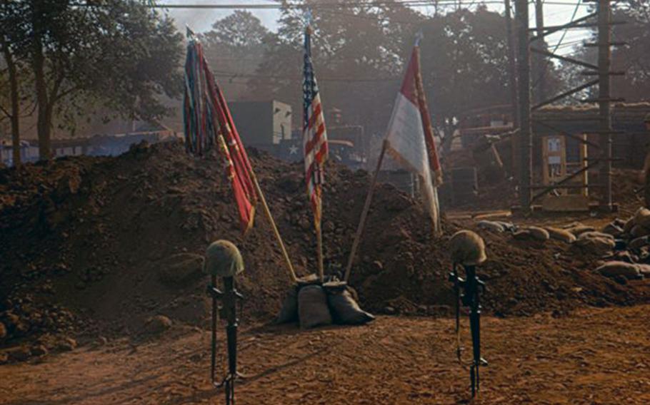 A ceremonial service in a base camp at Quan Loi, Vietnam, in 1968.