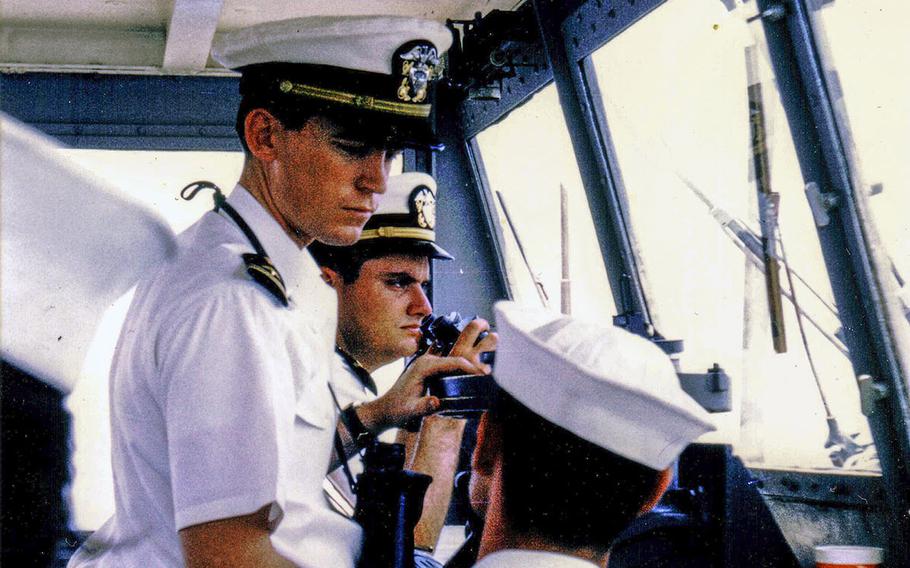 Ensign Bill Gross on the bridge of the USS Diachenko in August 1968 as the ship returns from its deployment to Vietnam and arrives in San Diego, Calif. Behind Gross is Ensign Dennis Devitt.