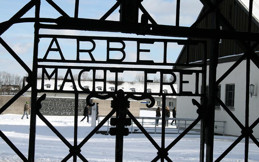 The front gate to Dachau includes the infamous slogan that translates to "Work makes you free."  From time to time, the signs at these concentration camps are stolen. One taken from the Dachau camp in November 2014 has yet to be recovered.
