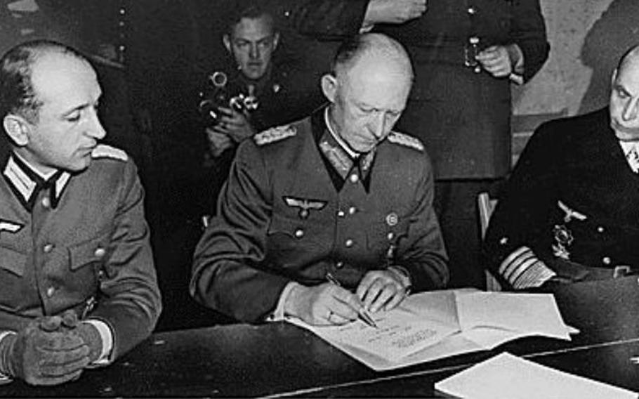 Alfred Jodl signs the unconditional surrender of Germany on May 7, 1945, in France. The following year, he was convicted of war crimes and executed.