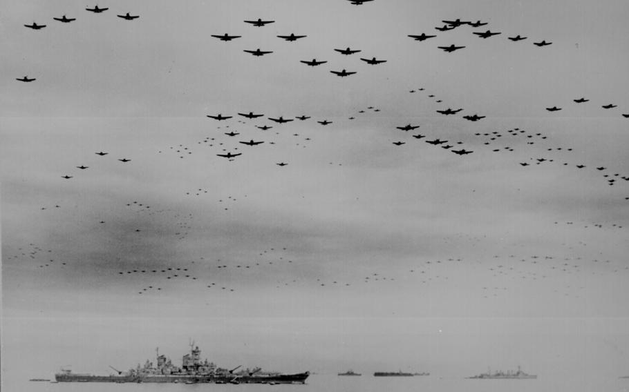 American F-4s and British F-6s fly in formation during surrender ceremonies above the USS Missouri in Tokyo Bay, Japan, on Sept. 2, 1945. 