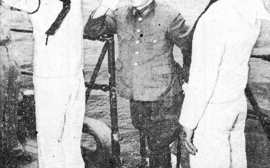 Maj. Imagawa, commander of the Japanese garrison on Rota, believed to number approxmately 4,000 men, comes aboard an American warship, USS Osmus to discuss terms for the surrender of the island which is about 50 miles north of Guam.