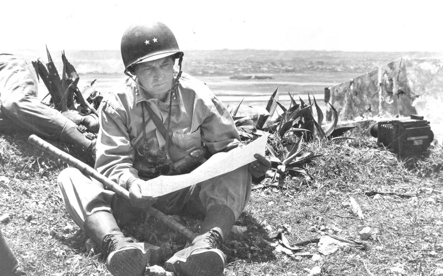 Maj. Gen. Lemuel C. Shepherd, Jr., commanding general of the 6th Marine Division, studies a map in April 1945 during the Battle of Okinawa.
