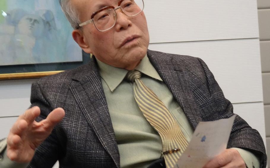 Shigeaki Mori, 77, a Hiroshima historian, recounts the aftermath of the 1945 Atomic bombing in Hiroshima to Susan Archinski, a niece of Normand Brissette, who was exposed to radiation from the bomb. 