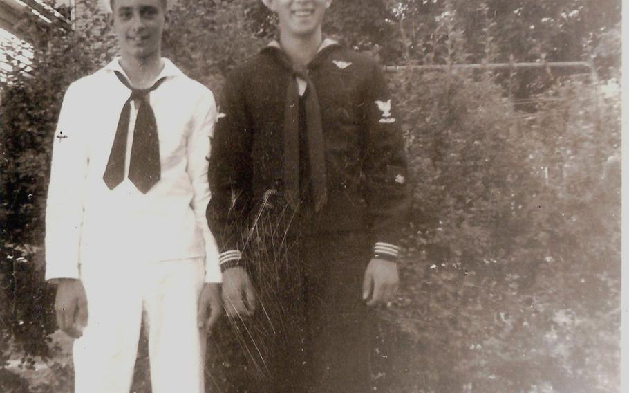 In this photo taken in 1945, Normand Brissette, right, 18, poses in his Navy uniform with his younger brother, Raymond, 15.