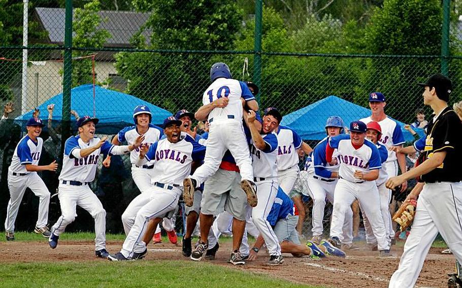 Ramstein celebrates after a Matt Sharpy double in the bottom of the ninth. The runs gave Ramstein a 2-1 win over Patch in the DODDS-Europe baseball championships in May 2014.