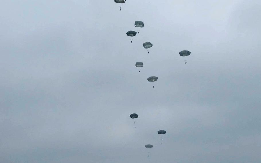 Approximately 150 paratroopers from the 4th Battalion, 319th Airborne Field Artillery Regiment conducted a heavy drop exercise on U.S. Army Garrison Bavaria, Jan. 29, 2014. The exercise was designed to safely drop heavy equipment into a remote location and have troops parachute down and get it operational as quickly as possible.
