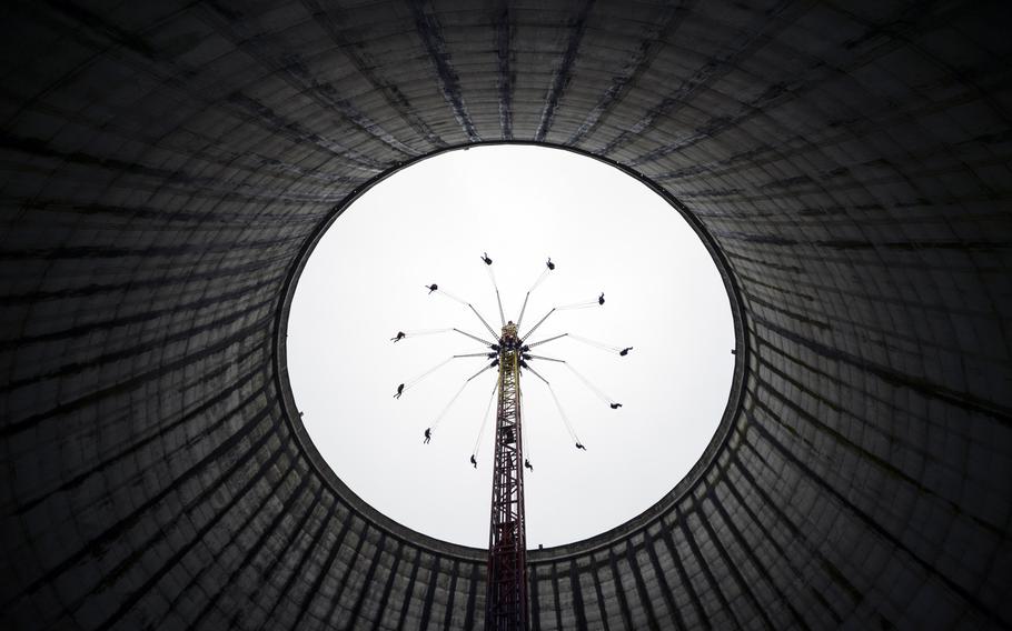 Kernie's Family Park's highlight is the 190-foot-high vertical swing that is housed in the cooling tower. The amusement park is in Kalkar, Germany.