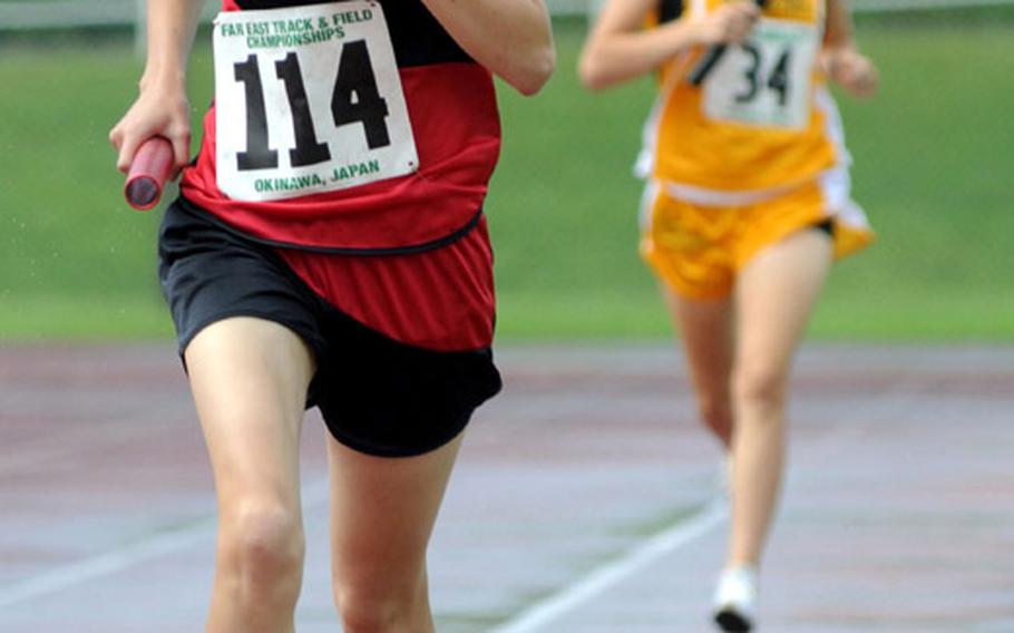 Junior Amanda Henderson of Seoul American (114) is one of four returning girls runners to the Falcons' cross-country team taking aim at its third straight overall Far East meet title.