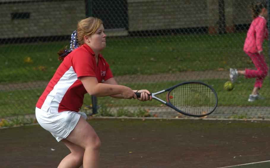 Lakenheath tennis player Rebekah Gamble returns a volley with a backhand shot during a tennis match Saturday at RAF Lakenheath, England. 