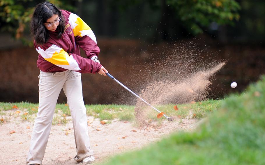Baumholder's Katarina Adriano hits out of the bunker during a match in Ramstein on Thursday.