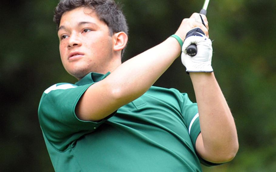 SHAPE's Zach Price keeps his eyes on his 18th-hole tee shot during a match in Ramstein on Thursday.