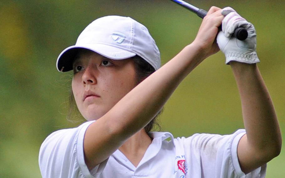 Ramstein's Elizabeth Ward follows the flight of the ball after teeing off Woodlawn's 11th hole on Thursday in Ramstein, Germany. Ward won the meet, the last before next week's DODDS-Europe championships, with a 33 under modified Stableford scoring.