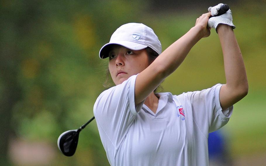 Ramstein's Elizabeth Ward follows the flight of the ball after teeing off Woodlawn's 11th hole last week in Ramstein. Ward won the match, the last before Thursday's DODDS-Europe championships, and a meeting with defending champ Hollie Salvo of Wiesbaden.