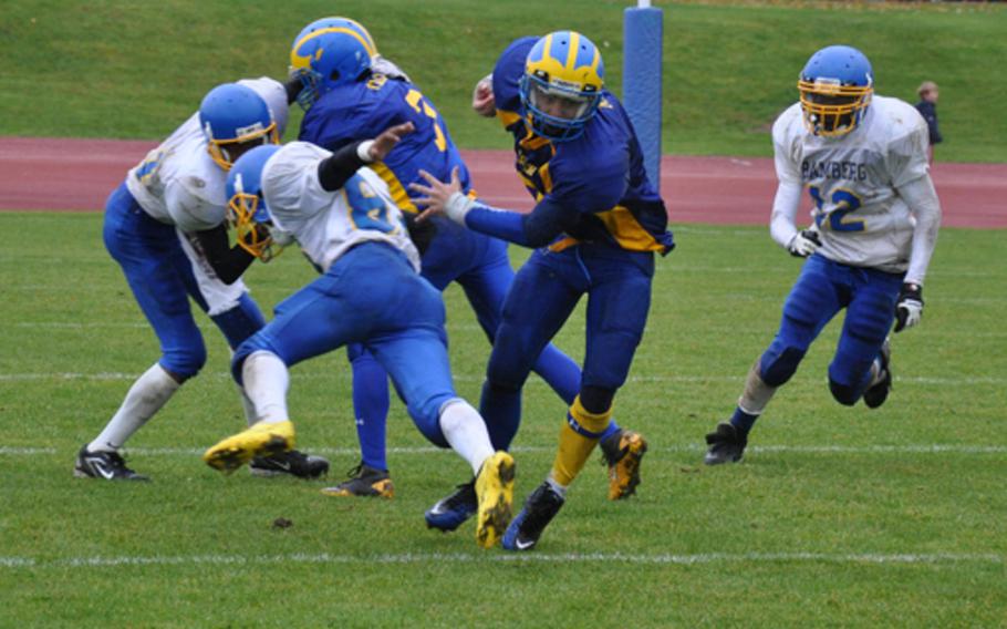 Ansbach's Alex Moyalooks looks for running room against the Bamberg defense Saturday in Ansbach. The Cougars won, 24-12, in a game marked by long scoring drives to finish the regular season undefeated.