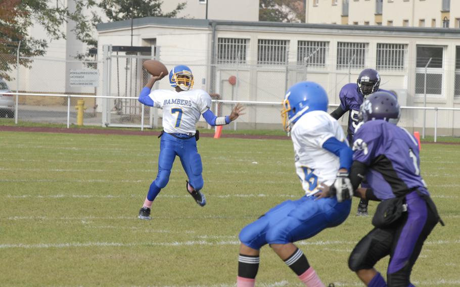 Bamberg's NaCari Madison attempts a pass during Saturday's D-II playoff game against host Mannheim.  Mannheim won, 51-20.