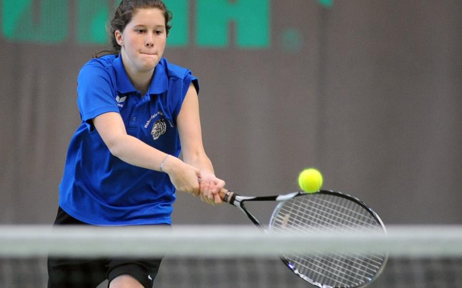 Casey Leon of Hohenfels returns a ball at the net against Erica Ruth of Naples during the DODDS-Europe tennis tournament in Wiesbaden, on Thursday. Leon won the first-round match 6-2, 6-3. She then became the first girls player to eliminate a seed, beating No. 7 Galal Ali Fahmi of Bahrain, 6-3, 6-4 in the second round.