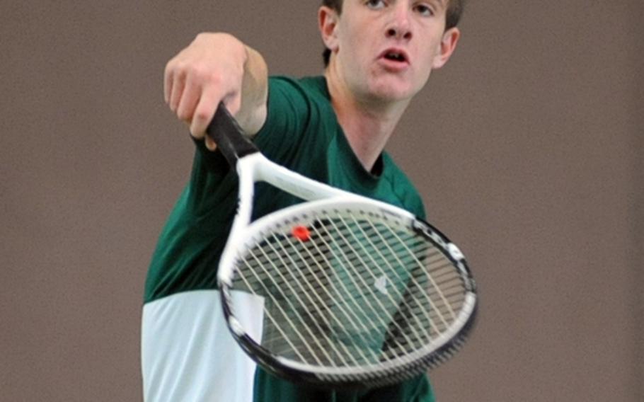 Alconbury's Ronald Behr hits a return in his 4-6, 6-4, 2-6 first-round loss against Kaiserslautern's Christopher Jimenez at the  DODDS-Europe tennis championship tournament on Thursday.