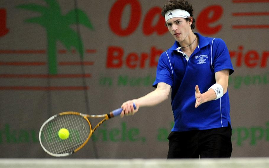 Ryan Bottesini of Brussels knock a shot from Milan's Giovanni Giorcelli back over the net, winning his first-round match 6-4, 6-2,  at the DODDS-Europe championship tournament in Wiesbaden, on Thursday.