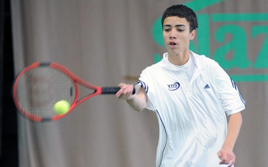Vilseck's Miguel Cordero Guzmanhits a forehand return during his 3-6, 3-6 first-round loss to Aviano's Joshua Campfield at the  DODDS-Europe tennis championship tournament.