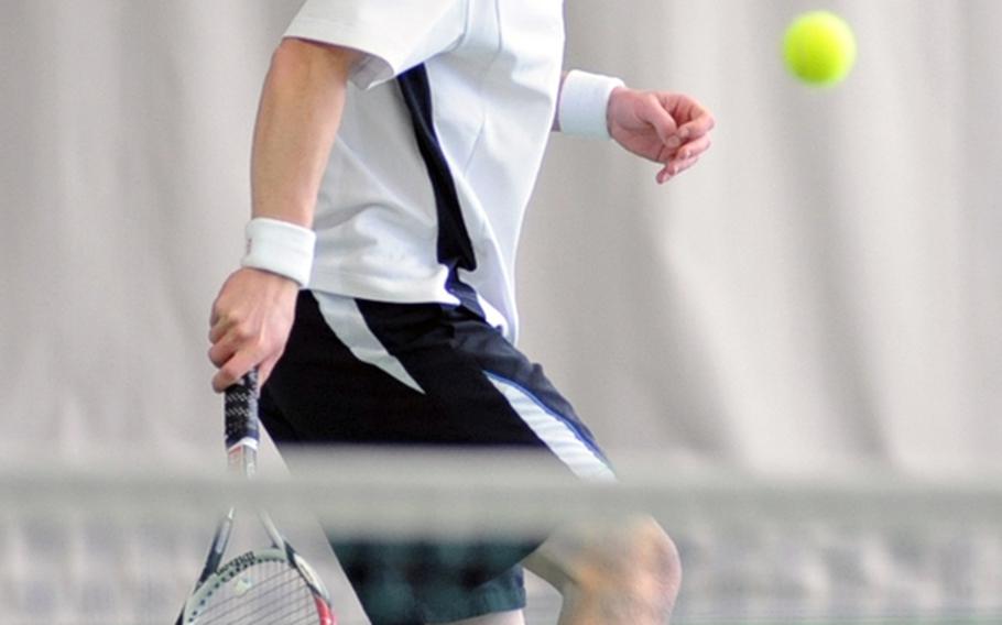 Aviano's Joshua Campfield watches his backhand slice sail over the net during his first-round match against Vilseck's Miguel Cordero Guzman at the DODDS-Europe tennis championship tournament in Wiesbaden, on Thursday. Campfield won 6-3, 6-3.